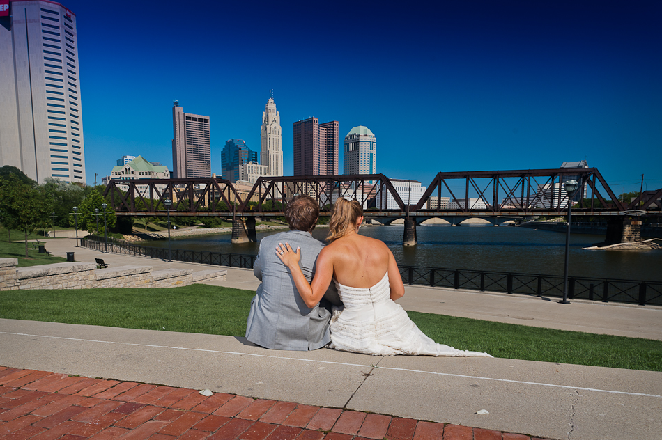 bride and groom looking at downtown Columbus 