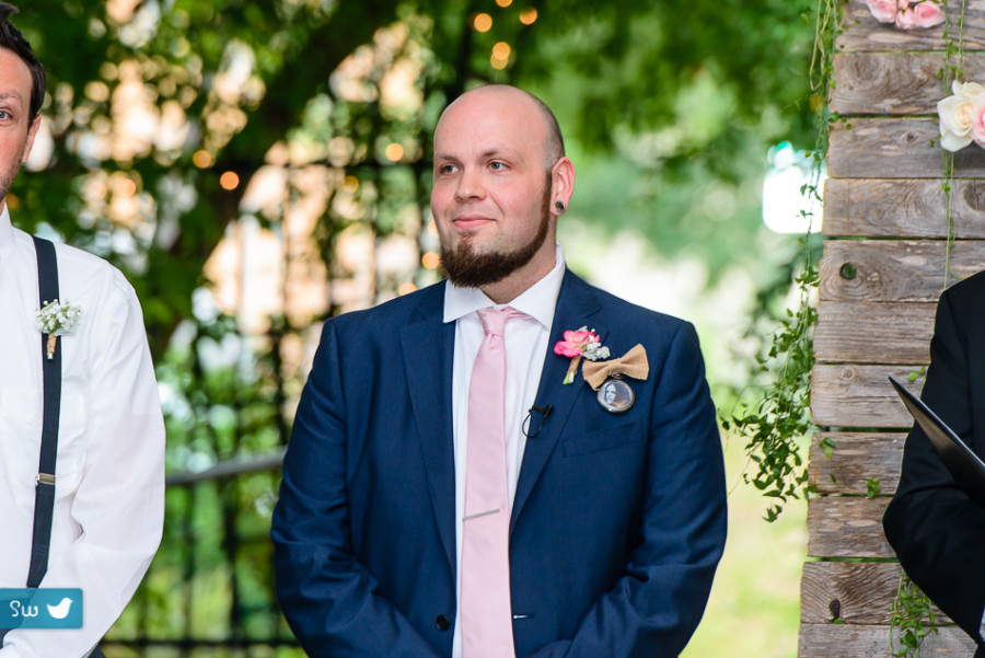 groom during ceremony waiting for bride