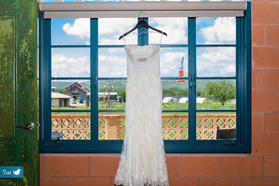 Pronovias lace and feather trim wedding dress at Montesino Ranch by austin wedding photographer