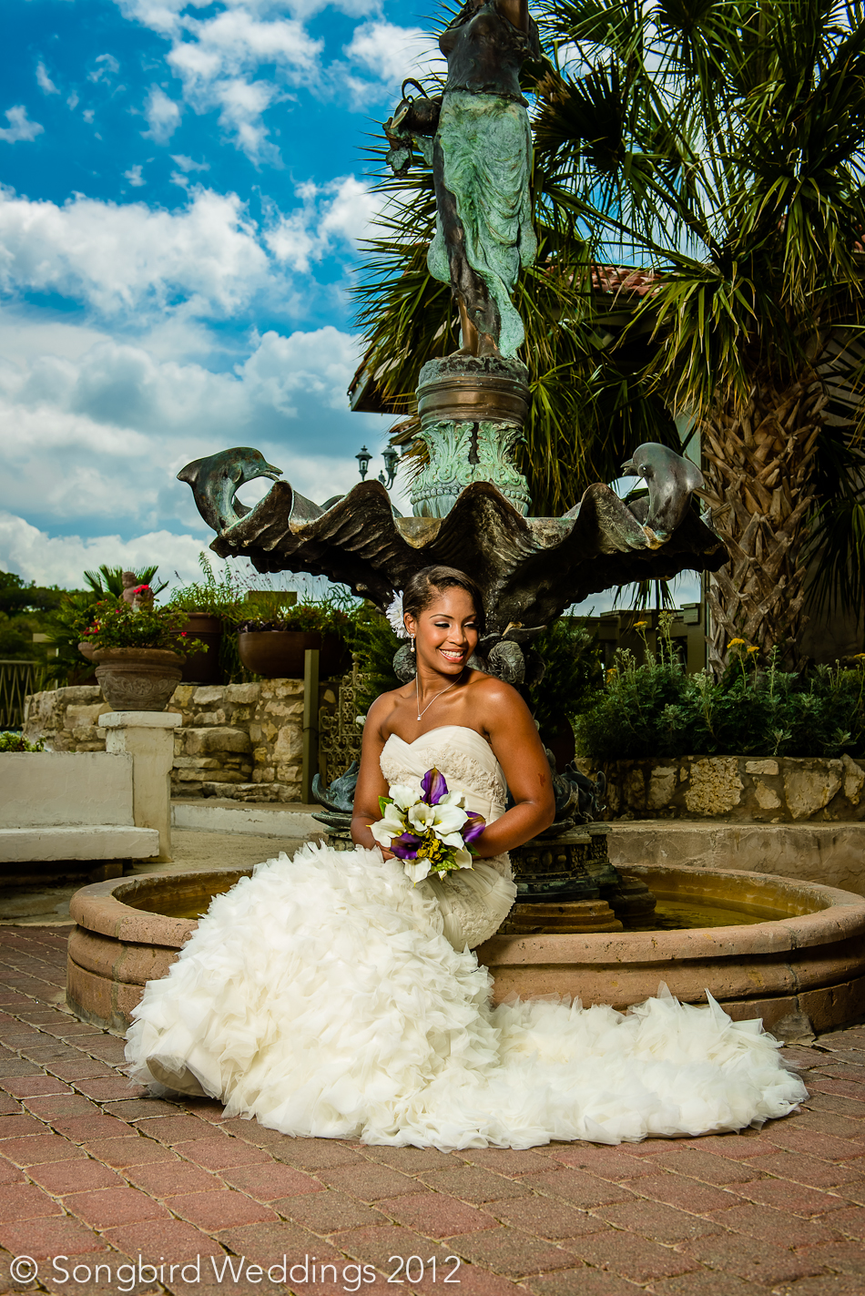 beautiful bride next to villa antonia fountain in austin
