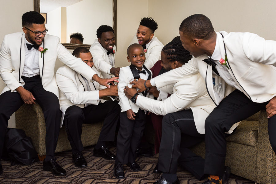 African American groomsmen getting ready, austin wedding photographers