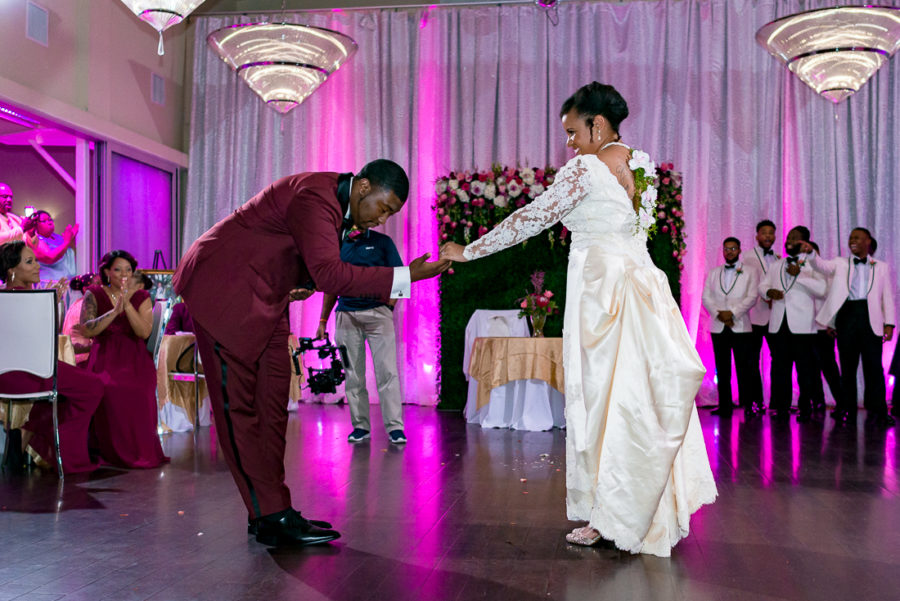 Pink and purple uplighting sterling events center by austin wedding photographers