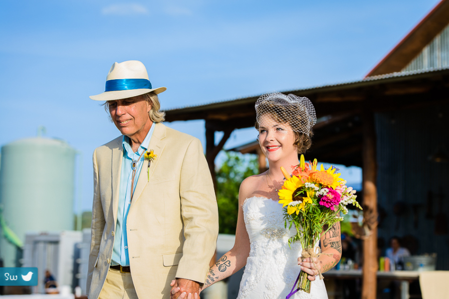 Bride holding wildflower bouquet at Montesino Ranch by Austin Wedding Photographer