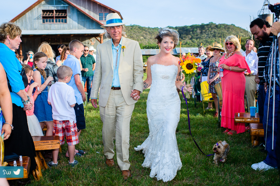 Bride holding wildflower bouquet at Montesino Ranch by Austin Wedding Photographer