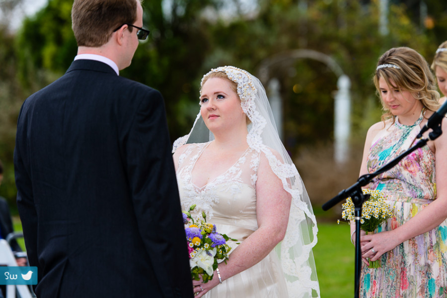 Bride during ceremony by Austin Wedding Photographer at Barr Mansion