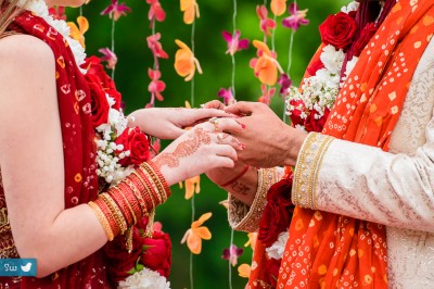 Indian Hindu wedding details of hand during ceremony