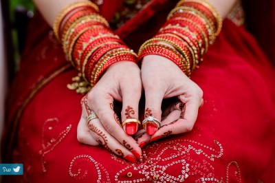 Mehndi (henna) designs and wedding ring details