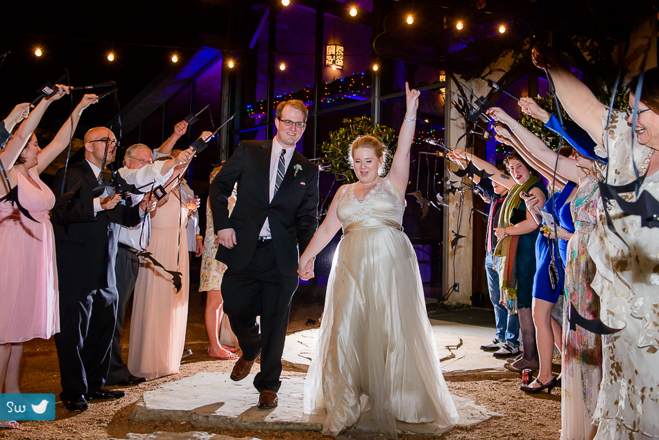 Waving bat wand exit by Austin Wedding Photographer at Barr Mansion