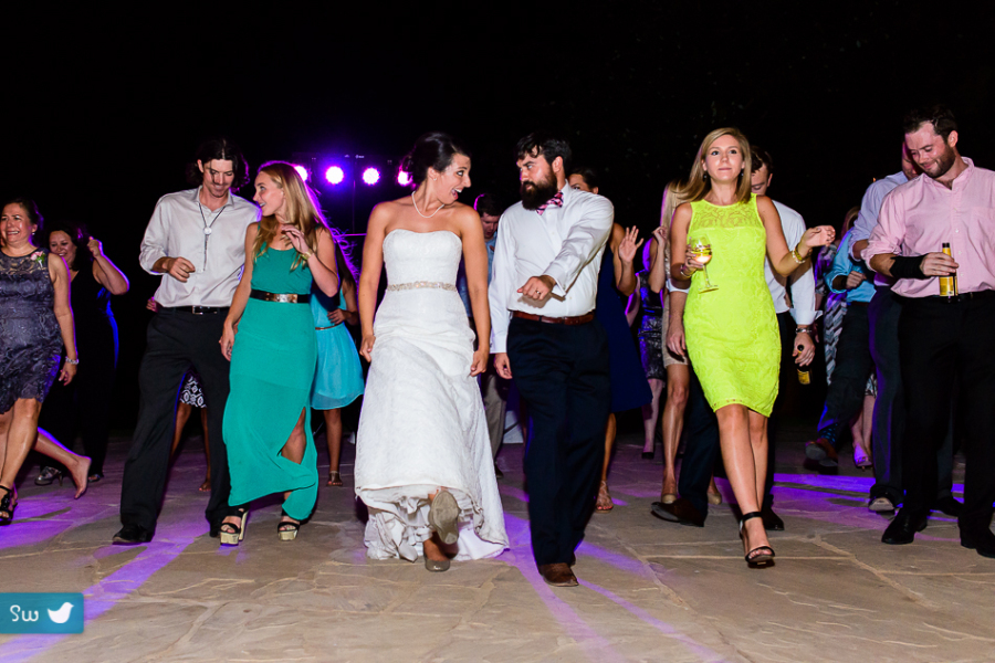 Adorable bride and groom line dancing at UT Golf Club by austin wedding photographer