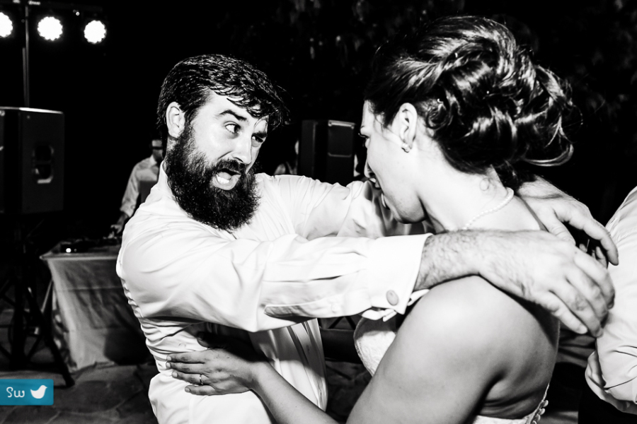 Groom and bride being silly on the dance floor at UT Golf Club by austin wedding photographer