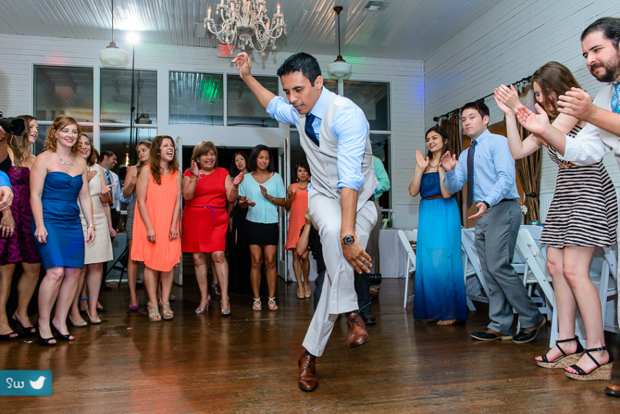 groom dancing at Mercury Hall, wedding photography in austin