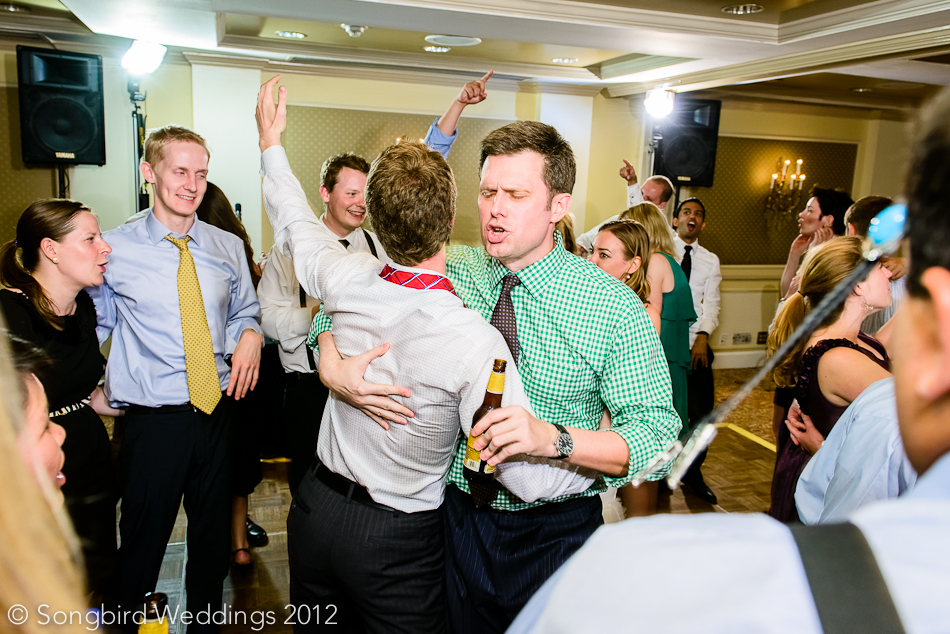 guys dancing at Driskill Hotel wedding reception in Austin