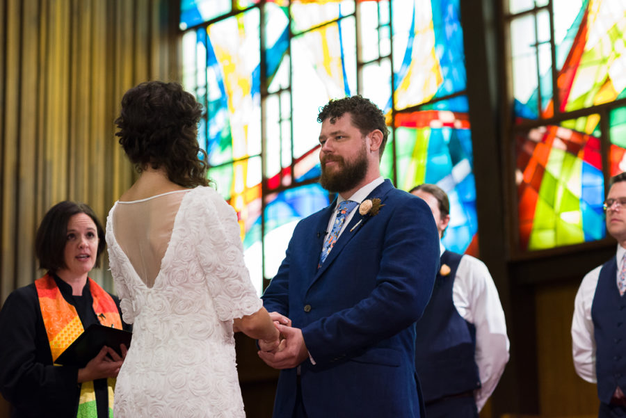 ceremony-Austin-Wedding-Photographers-groom-bride-glass-stained-officiant-central-presbyterian-church