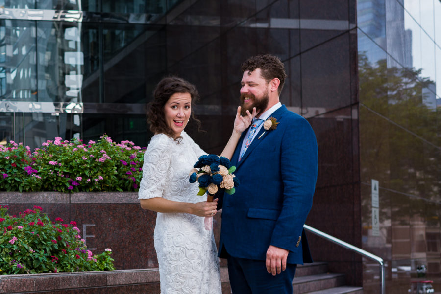 groom-bride-Austin-Wedding-Photographers-portraits-downtown-texas-couple-fun-flowers-city