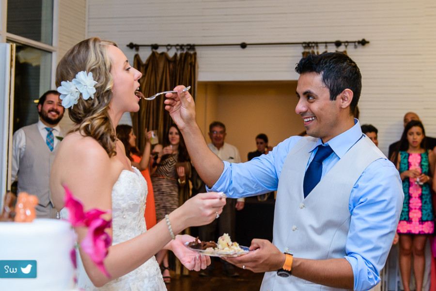 groom feeding bride cake, austin wedding photography