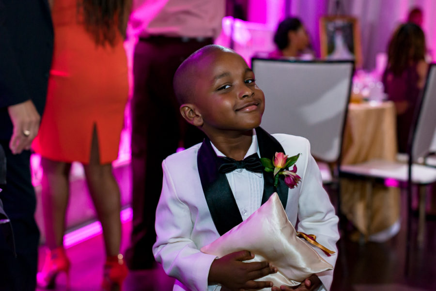 cute boy during reception at Sterling Events Center by austin wedding photographers