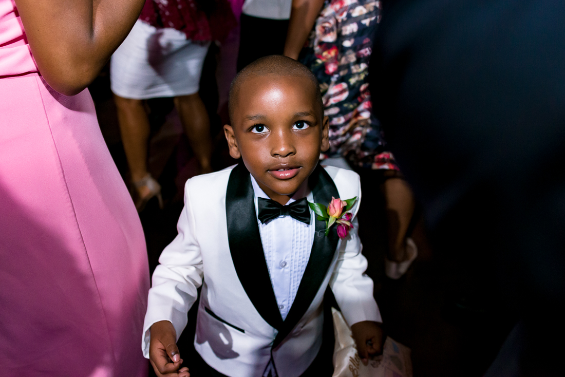 cute boy in tuxedo at black austin wedding in texas photographers