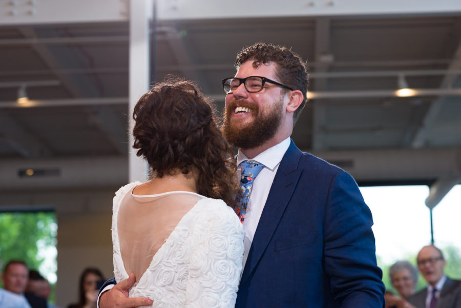 reception-Austin-Wedding-Photographers-bride-first-dance-groom-laughing