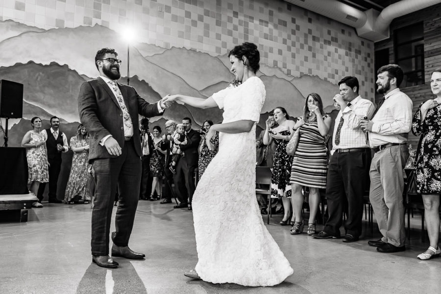 Austin-Wedding-Photographers-reception-bride-first-dance-laughing-guests-party