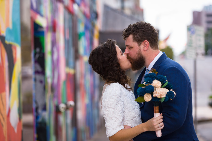 texas-Austin-Wedding-Photographers-kiss-portrait-mural-downtown-graffiti-street-bride-groom
