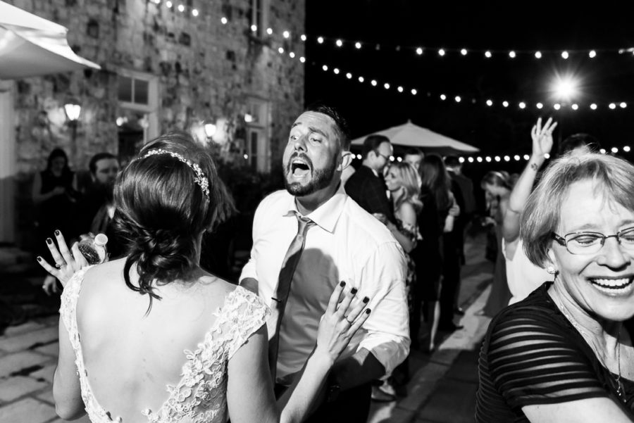 bride groom dancing outdoor night reception le san michele austin wedding photographers