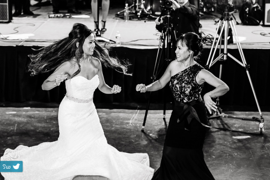 bride dancing with mother by Austin Wedding Photographer