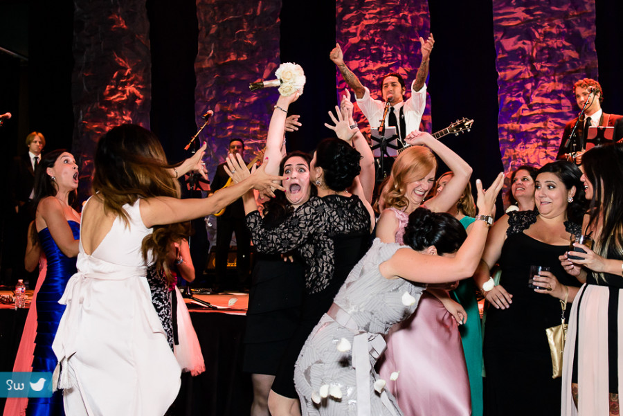 bouquet toss by Austin Wedding Photographer